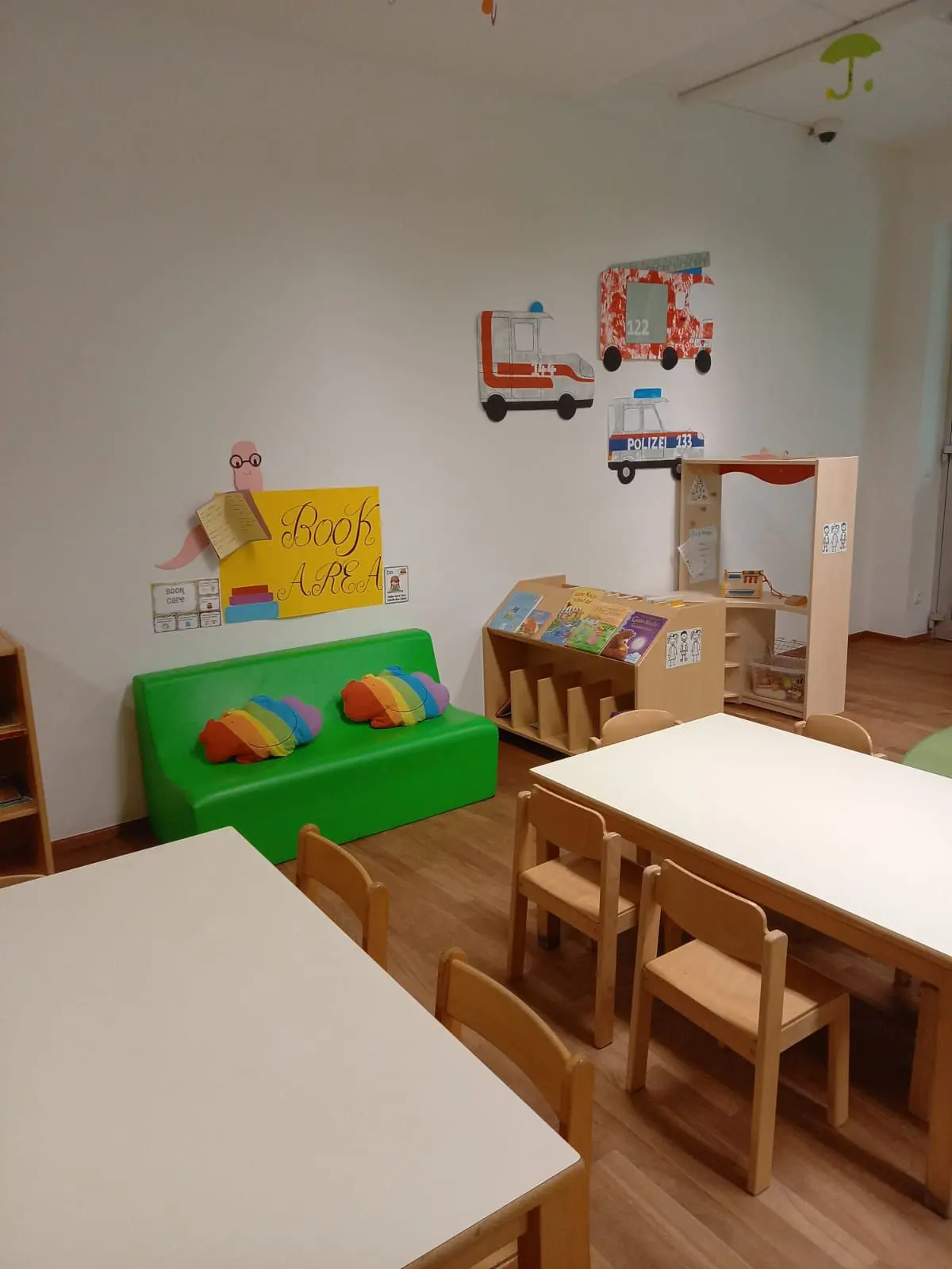 Green Couch Classroom Table at Vienna English Preschool