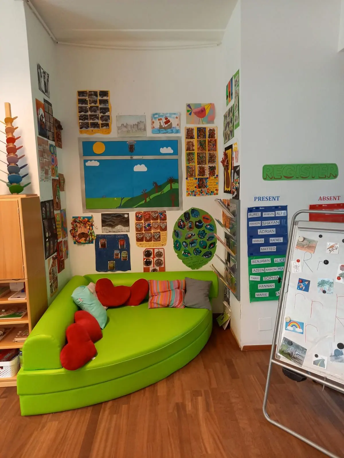 Green Couch Classroom Board at Vienna English Preschool