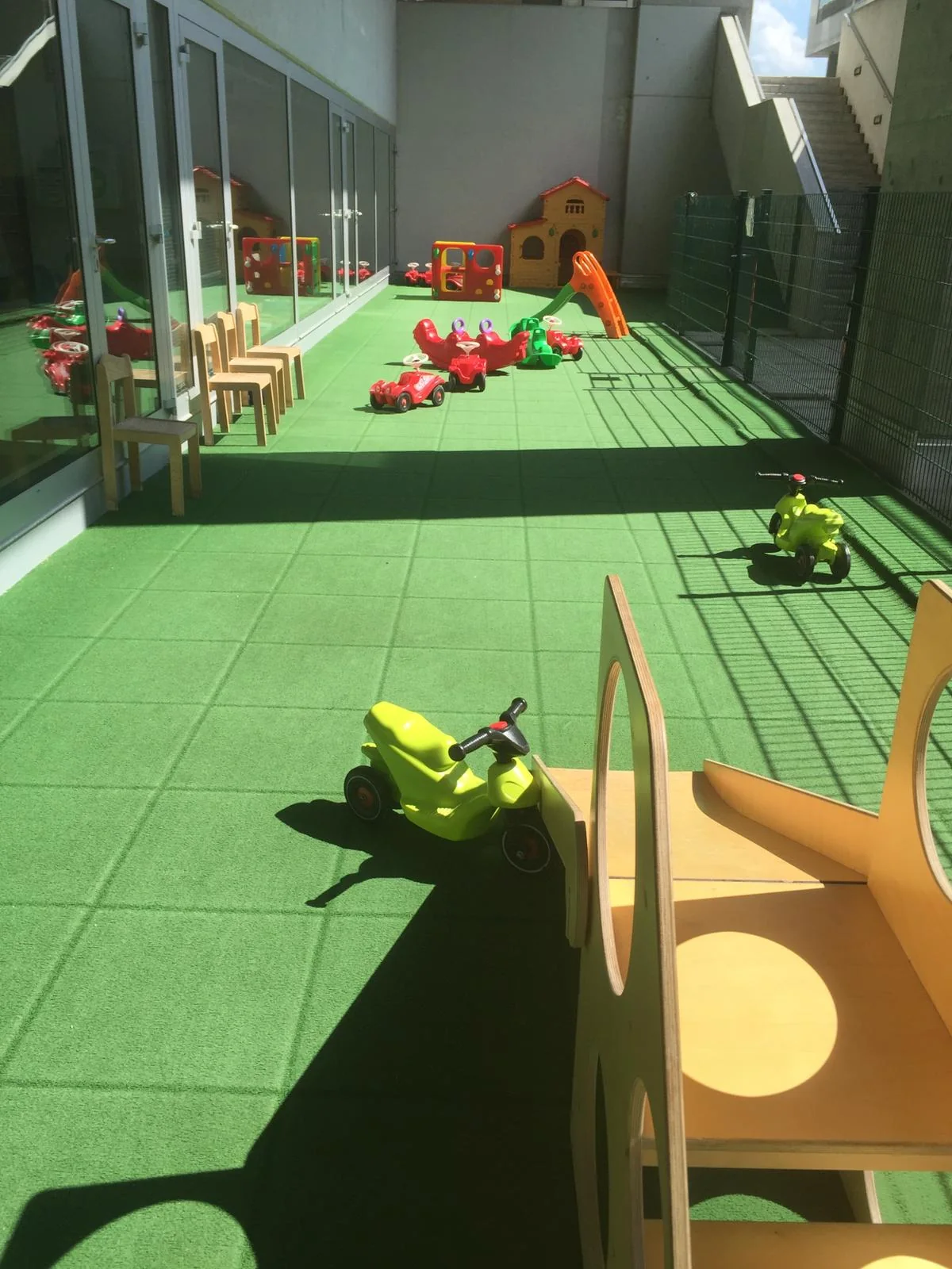 Outdoor Terrace Ride On Toys at Vienna English Preschool