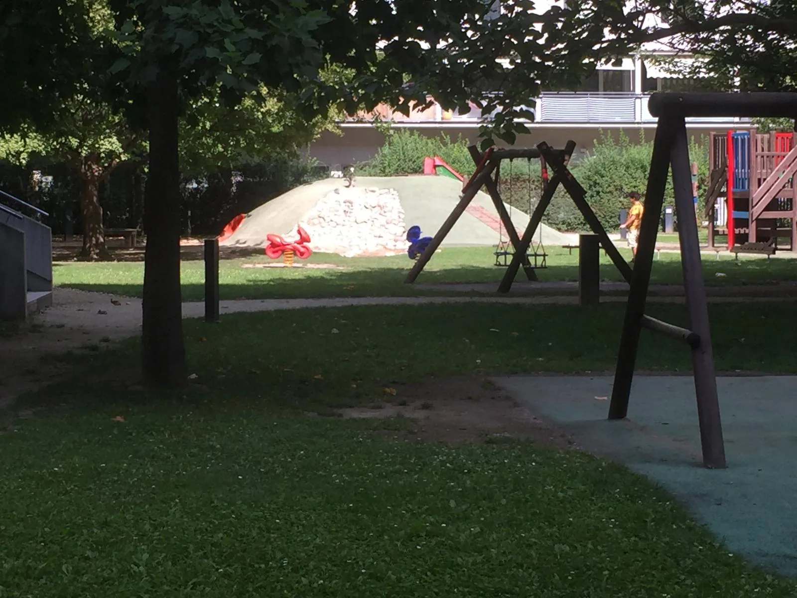 Garden Swings And Mound at Vienna English Preschool